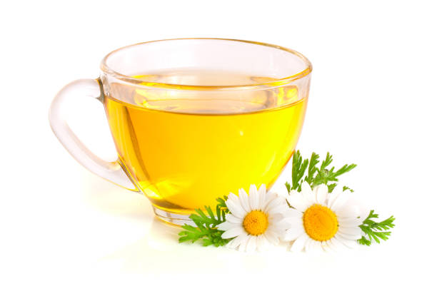 istock Herbal tea with fresh chamomile flowers isolated on white background 838023492