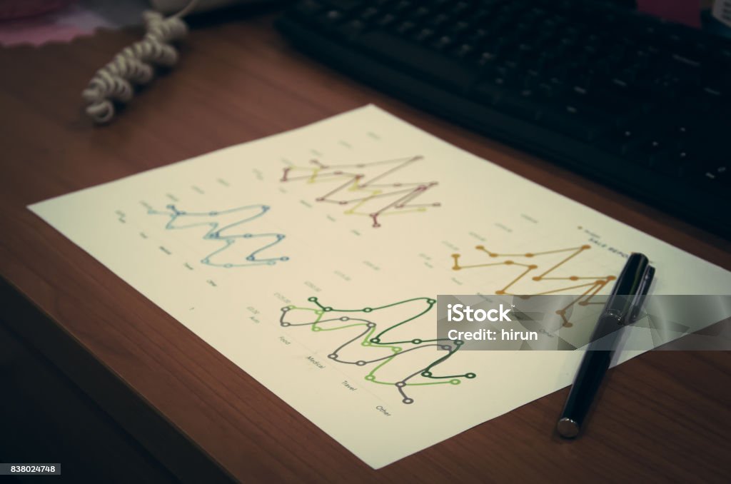 Graph Line On The Desk Stock Photo - Download Image Now - Business ...