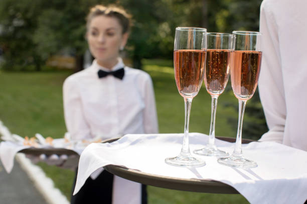 istock Crop waiter holding tray with glasses on event 838027474