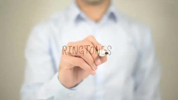 Ringtones , man writing on transparent screen