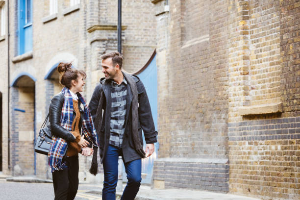 istock Beautiful couple walking on the streets 838033448