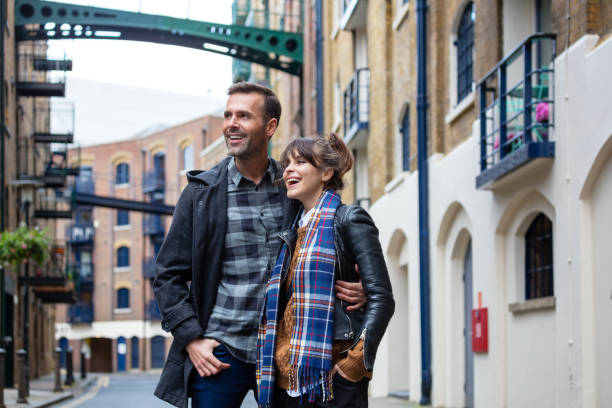 istock Beautiful couple looking at a view in city 838041096