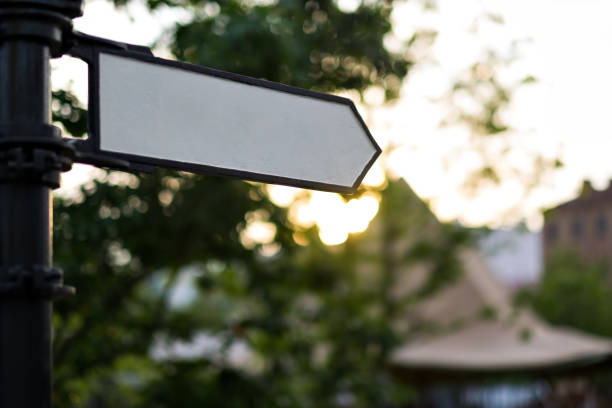 istock Arrow sign on park or street background 838043674