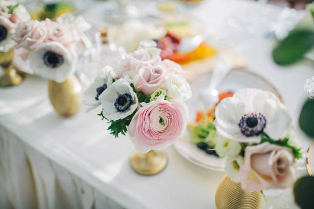 istock wedding decorated flowers in a vases in bright interior 838043812