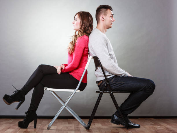 istock Young couple after quarrel sitting back to back 838048018