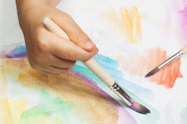 istock Children's drawing watercolor and brushes 838048828