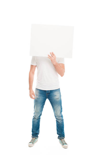 istock 'Handsome man hiding face by blank banner, isolated on white 838051454