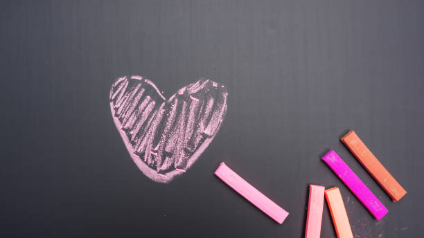 istock chalk pastels on a school blackboard for a background. 838074266