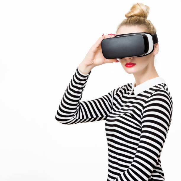 istock Attractive woman wearing virtual reality glasses. VR headset. 838074878