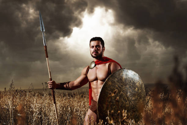 istock Muscular medieval warrior standing in the field 838078342