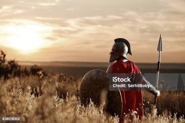 Warrior Wearing Iron Helmet And Red Cloak Stock Photo - Download Image Now - Gladiator, Roman, Empty