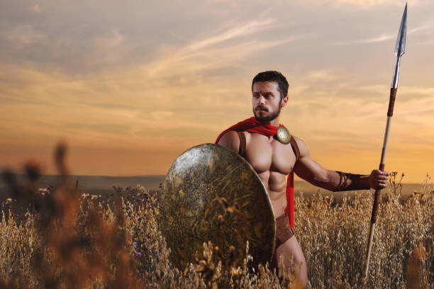 istock Muscular medieval warrior standing in the field 838078368