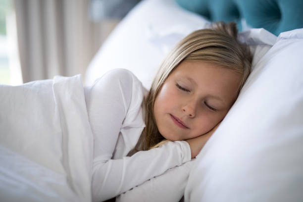 istock Girl sleeping on bed in bedroom 838078726