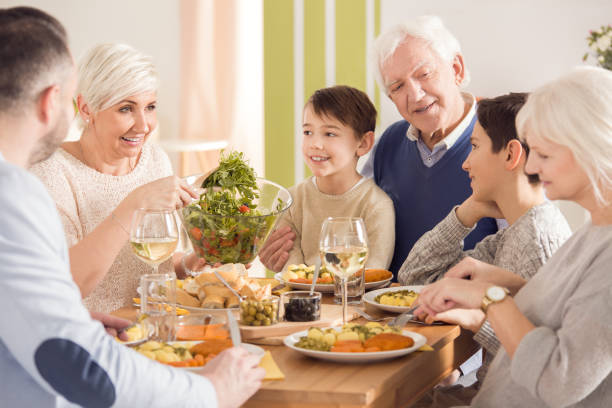 istock Mom putting salad on plate 838079034