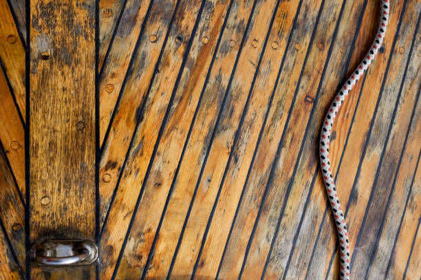 istock yellow wooden deck with rope 838089220