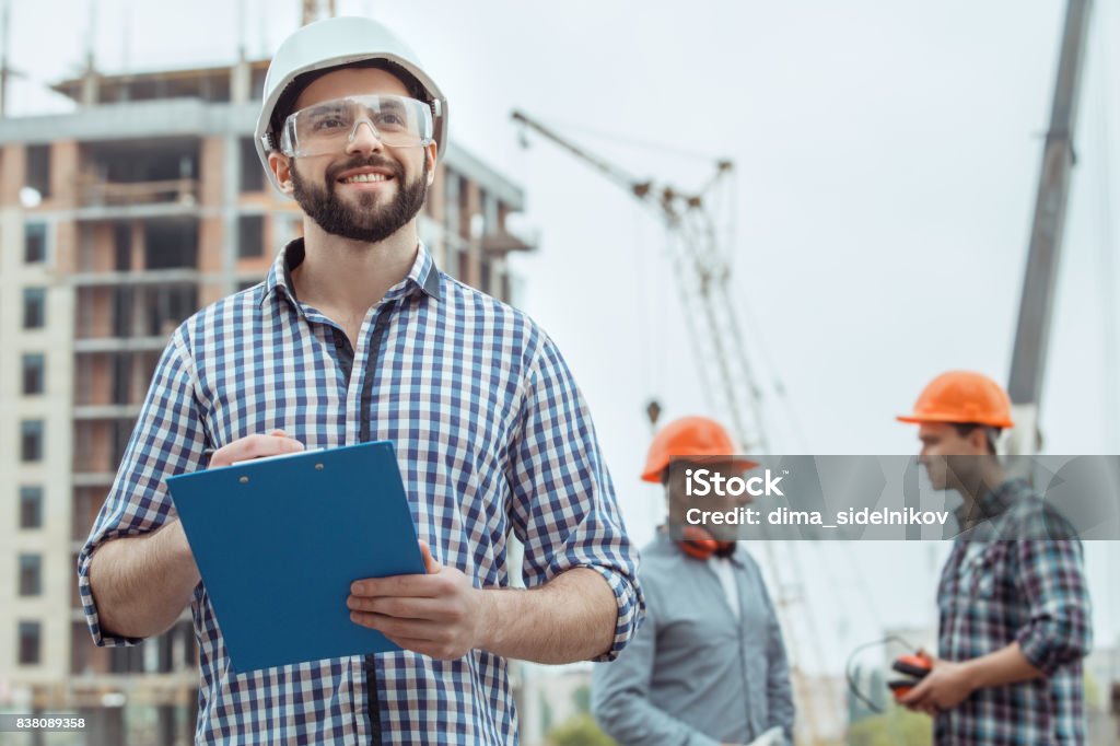 Männliche Arbeit beim Bau engineering Besetzung Bauprojekt. - Lizenzfrei Ingenieur Stock-Foto