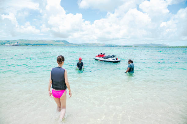 istock Woman challenging flyboard in guam 838090234