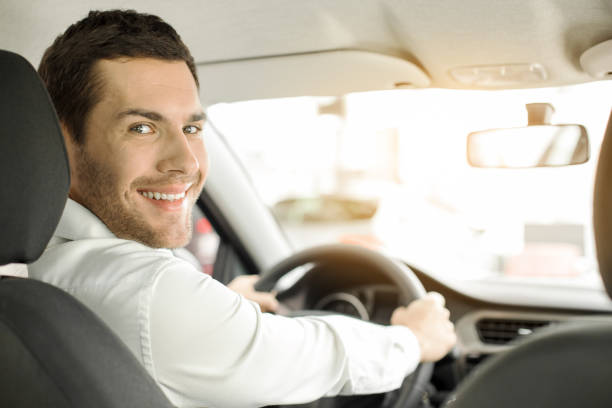 istock Young Man in a Car Rental Service Test Drive Concept 838094822