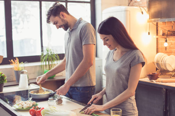 istock Young couple cooking in kitchen 838108772