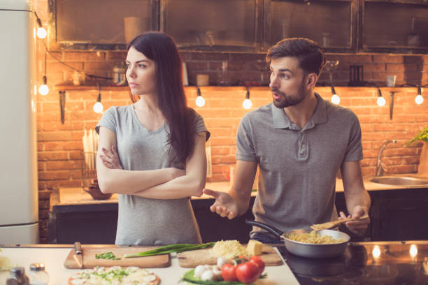 istock Young couple cooking in kitchen 838115010