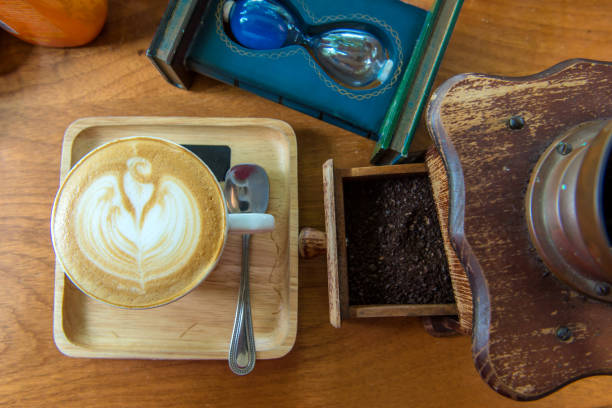 istock latte art coffee or cappuccino on wooden table background 838116864