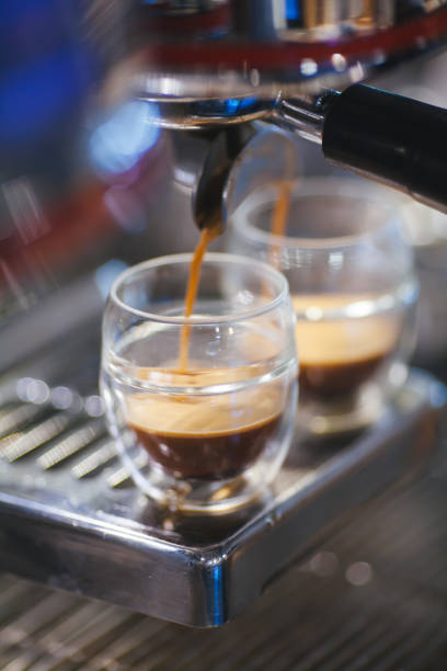 istock Espresso machine filling two cups of coffee 838119132