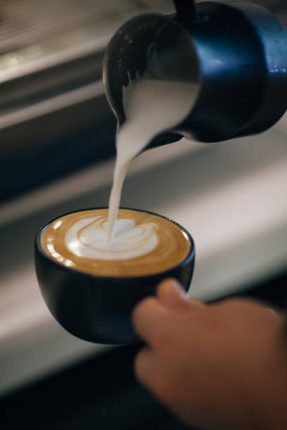 istock Barista Pouring Latte Froth Art 838121468