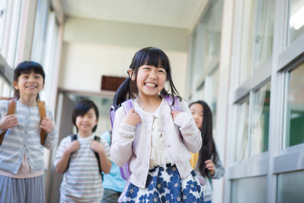 Elementary school children carrying bag Elementary school children carrying bag randoseru stock pictures, royalty-free photos & images