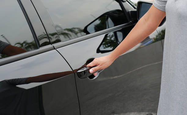 istock Hand on handle to open car door. 838128218