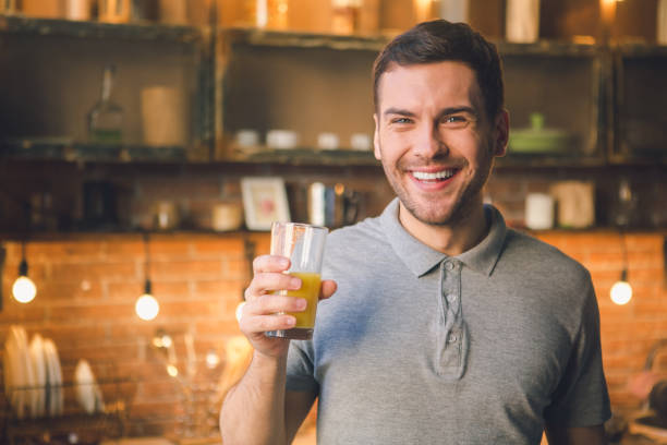 istock Young man vegan drinking juice healthy lifestyle 838132656