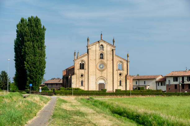 Lodivecchio (Lodi, Italy): church of San Bassiano Lodivecchio, Italy - June 24, 2017: The historic church of San Bassiano near Lodivecchio (or Lodi Vecchio, Lodi, Lombardy, Italy), exterior lodi italy stock pictures, royalty-free photos & images