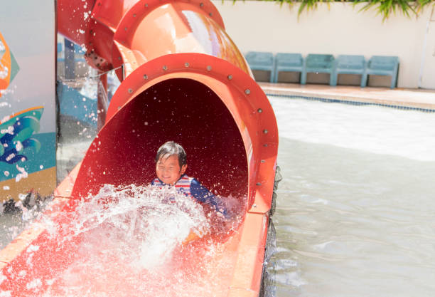istock Boy swimming in outdoor pool 838137530