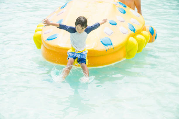 istock Boy swimming in outdoor pool 838137874