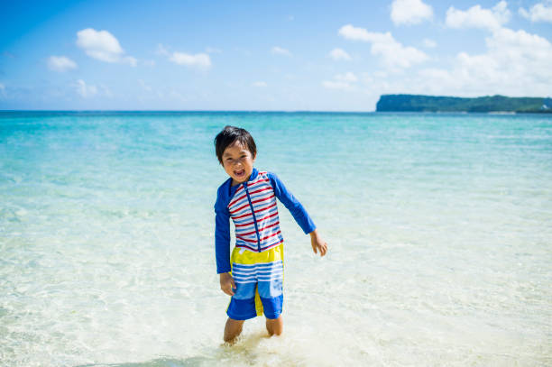 istock Family enjoying beach 838137934