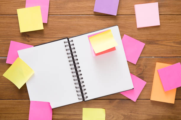 istock Top view of blank notepad on wooden office desk 838138080