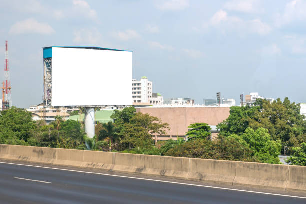 istock billboard blank on road in city for advertising background 838143944