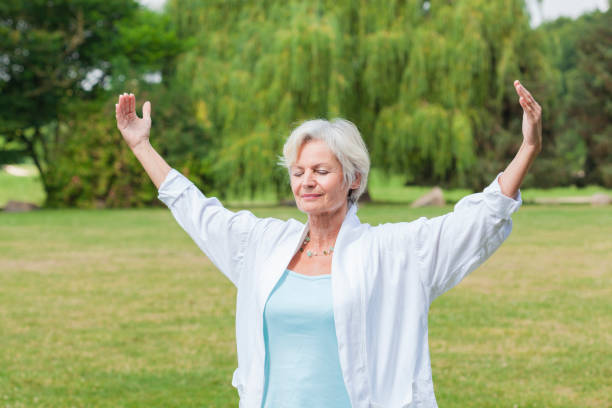 istock senior woman practicing yoga 838151432