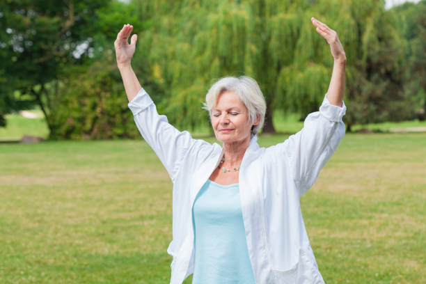 istock senior woman practicing yoga 838151506