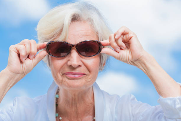 istock senior woman practicing yoga 838152476