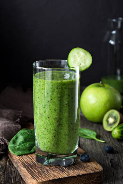 istock Green smoothie in glass 838159294