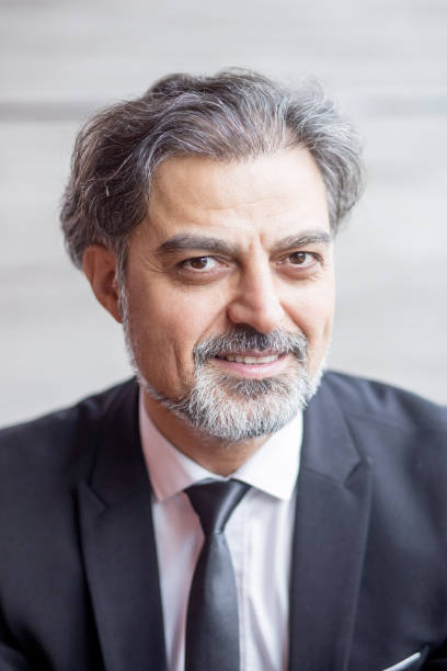 istock Closeup of Smiling Middle-aged Business Leader 838164270