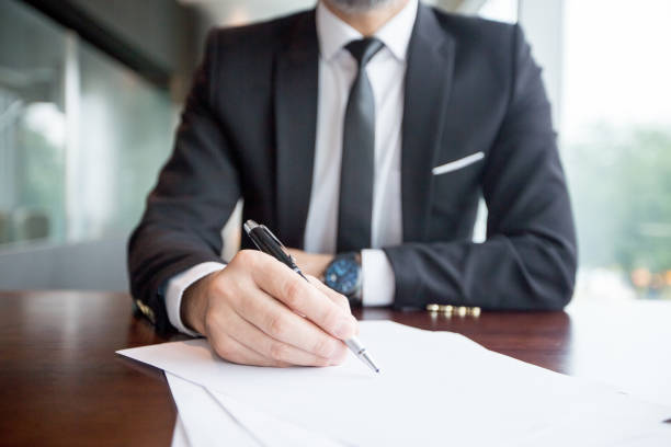 istock Cropped View of Business Leader Making Notes 838164330