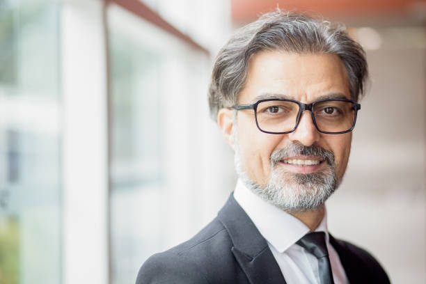 istock Positive Middle-aged Business Leader at Window 838164418