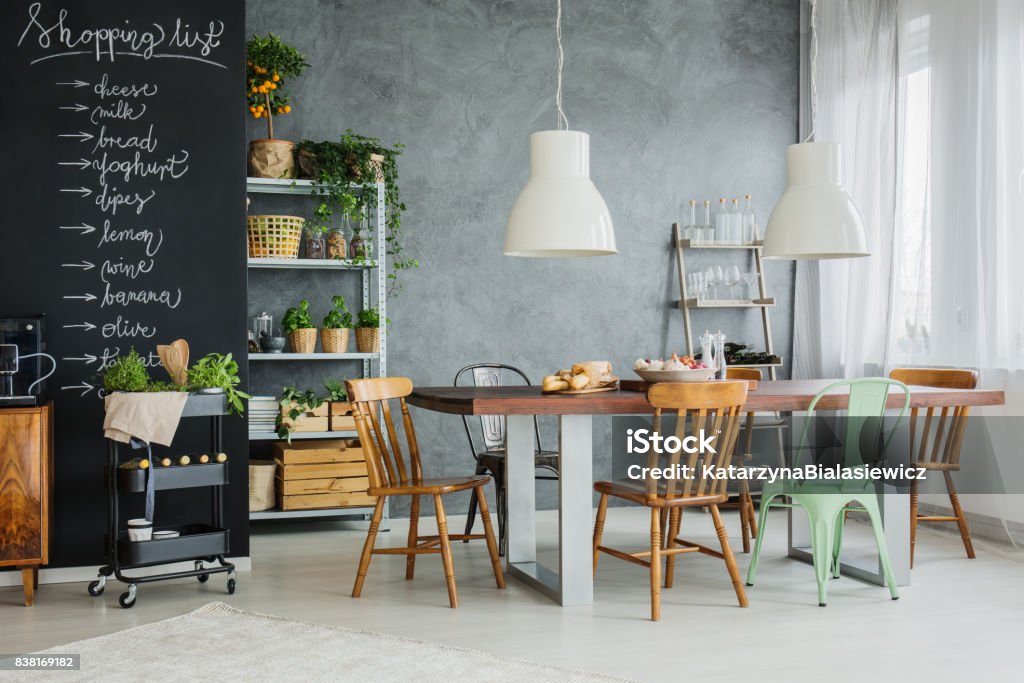 Stylish kicthen table Stylish,industrial and big kitchen table in loft Kitchen Stock Photo