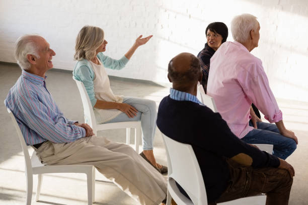 istock Ssenior people sitting on chair 838172398