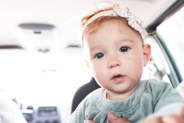 istock Baby girl looking inquisitively at the camera 838181130