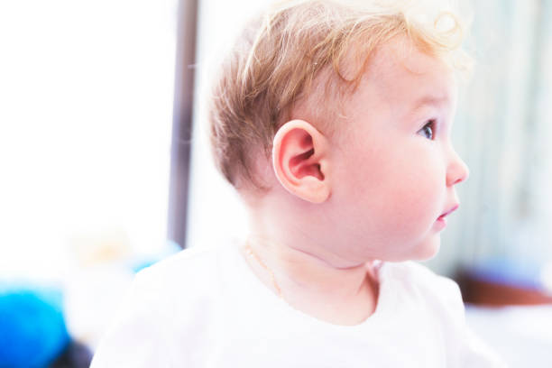 istock Curious baby girl looking around her room 838181198