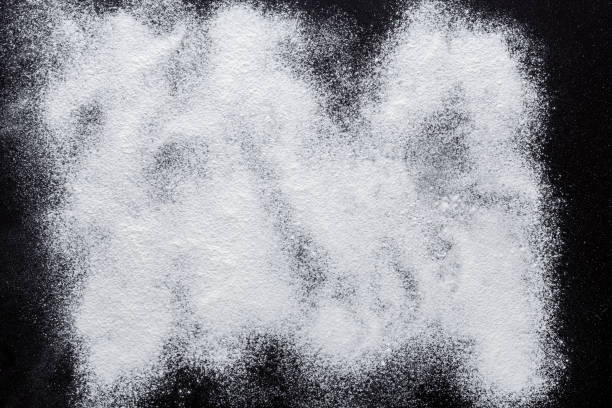istock Baking concept on black background, sprinkled flour with copy space 838186206