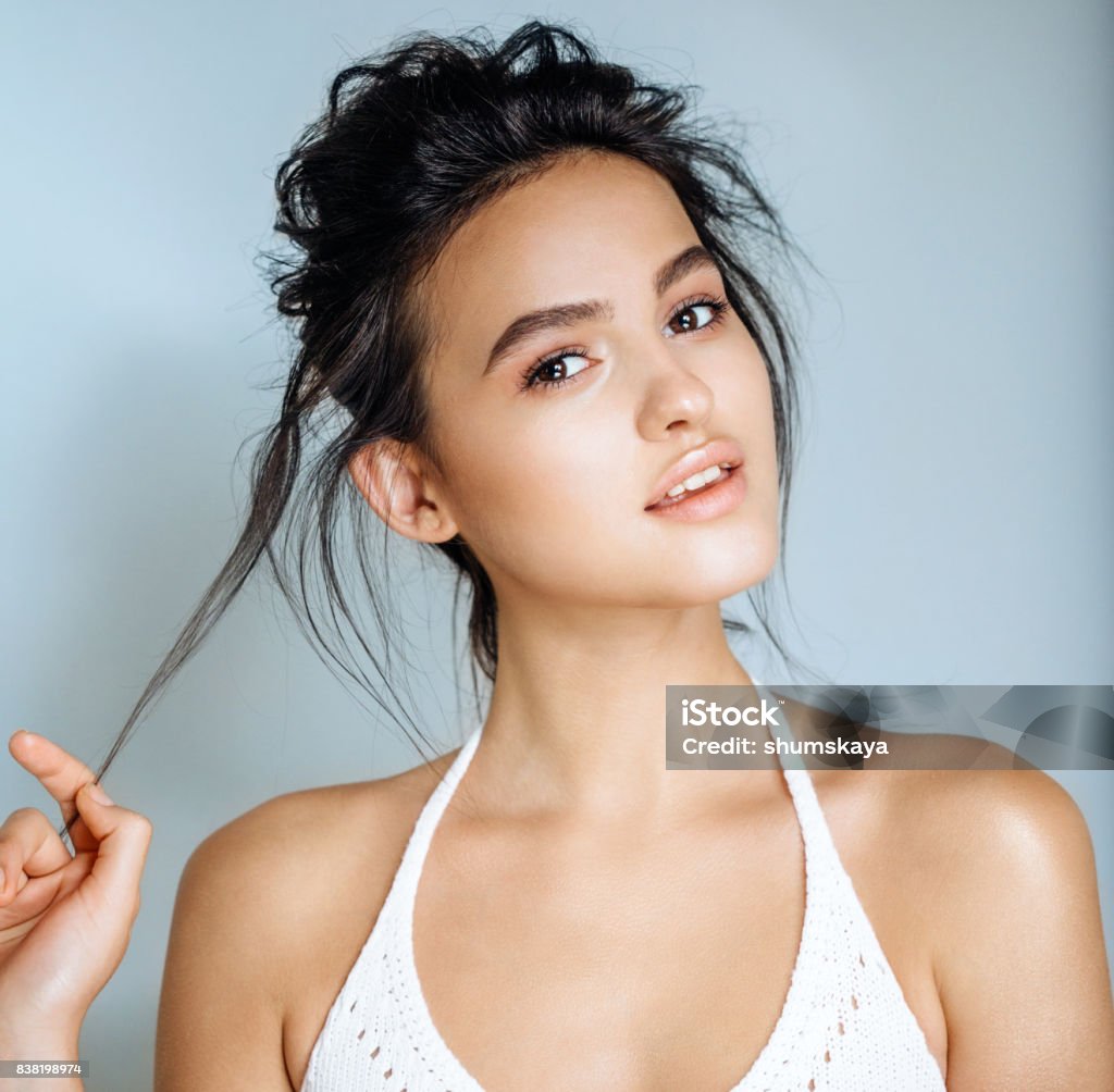Beautiful woman face close up studio Beauty Woman with perfect healthy skin Portrait. Women Stock Photo