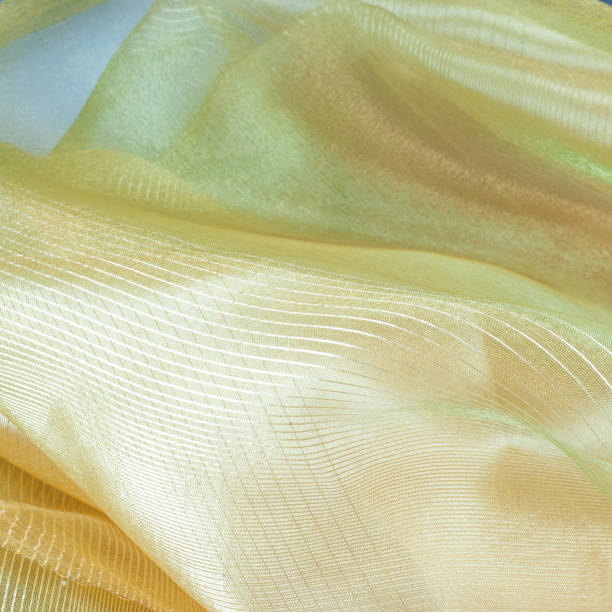 istock green silk fabric texture, salad coloring 838209474